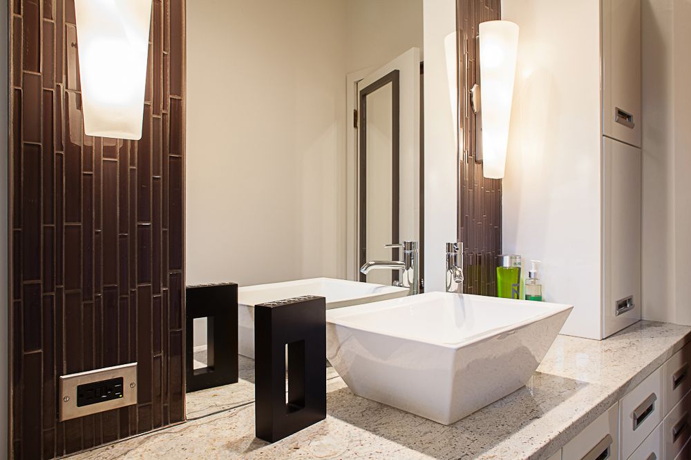 bathroom vanity with large square vessel sink