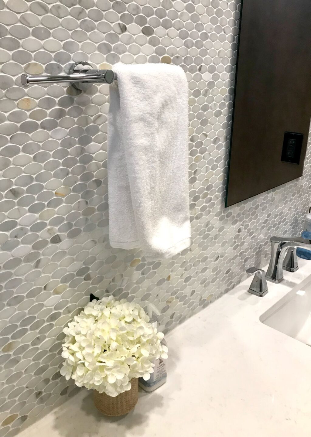 mosaic tile backsplash in custom bathroom renovation