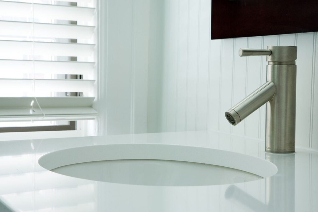 bathroom renovation with undermount sink and small vanity