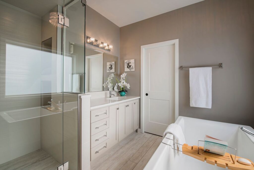 custom ensuite renovation with freestanding bathtub and walk-in shower