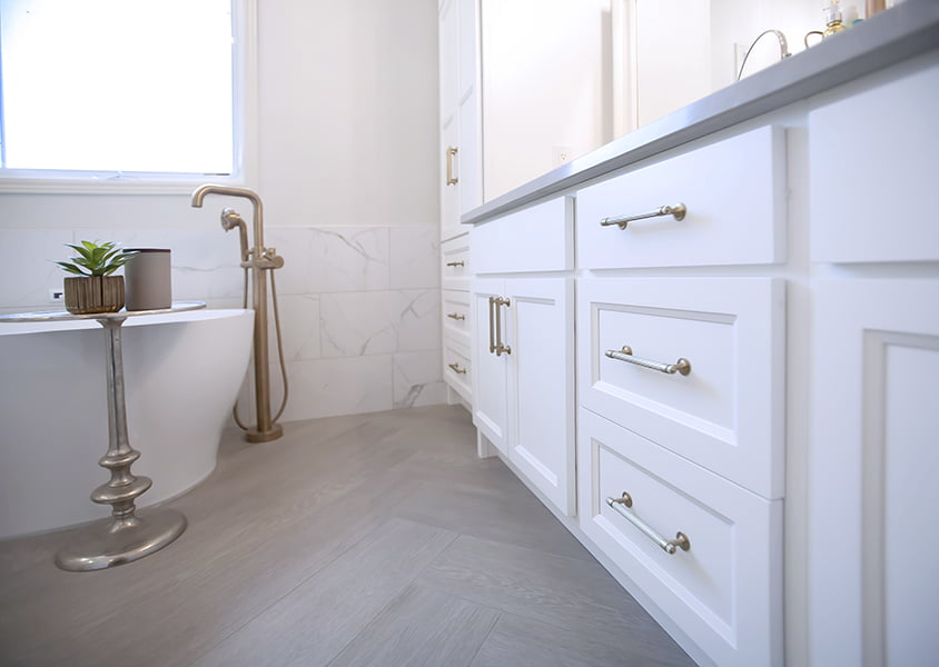 custom ensuite renovation with double vanity and freestanding bathtub