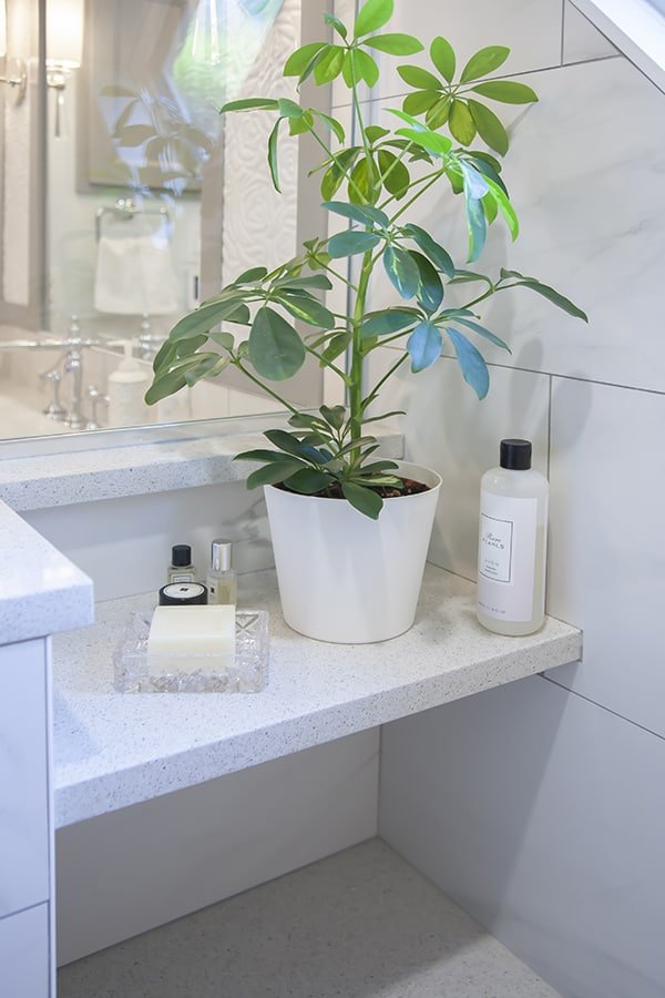 custom shower renovation with quartz bench and shelf