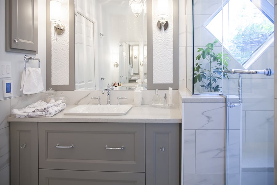bathroom renovation with custom vanity and walk-in shower