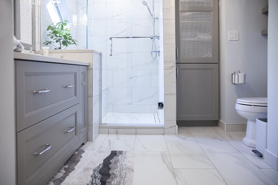 custom bathroom renovation with vanity cabinet and walk-in shower
