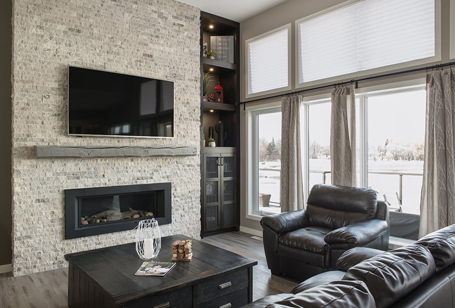 living room renovation custom fireplace with distressed mantle and built in shelves