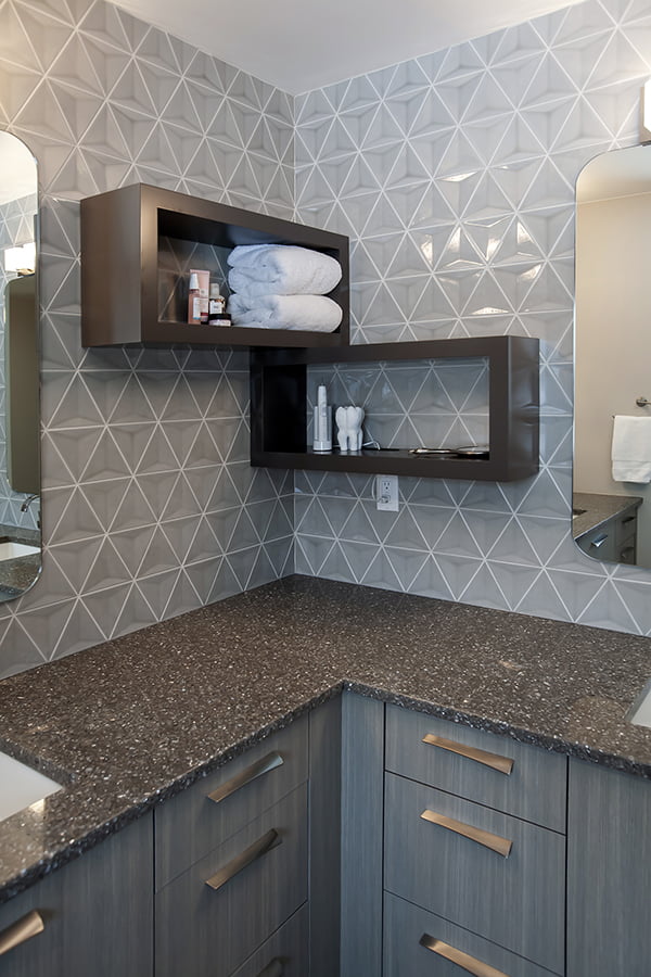 corner mounted floating shelves in custom bathroom remodel