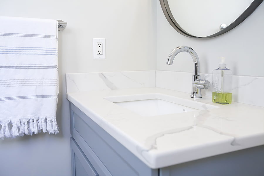custom bathroom vanity with blue finish and undermount sink