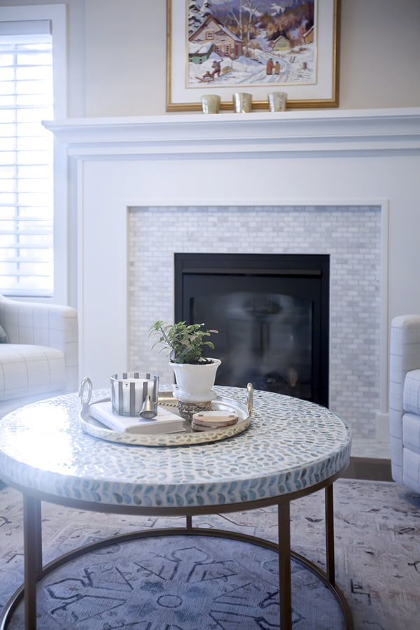 Winnipeg Custom Milwork white custom fireplace with inset mosaic tile