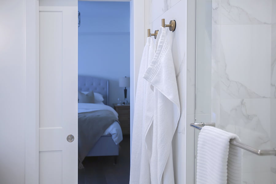 ensuite renovation with pocket door and walk-in shower