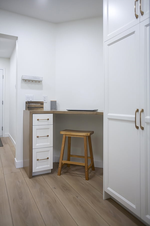 Design Home Reno command centre with work space and custom cabinets